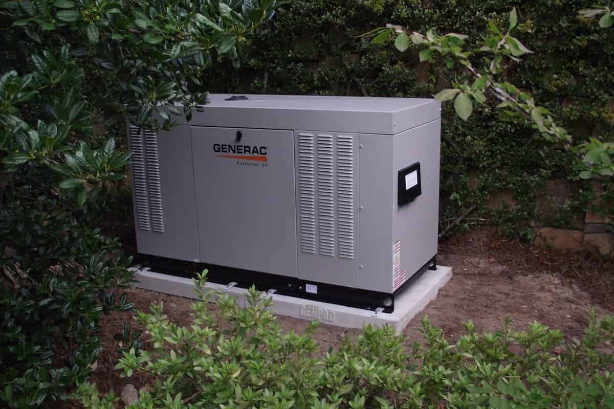 Whole-home standby generator installed on a pad
